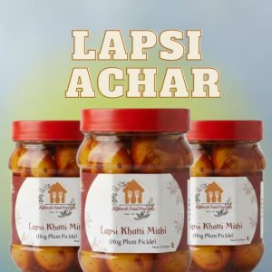 Authentic Nepali Lapsi Khatti Mithi achar jar with spices.