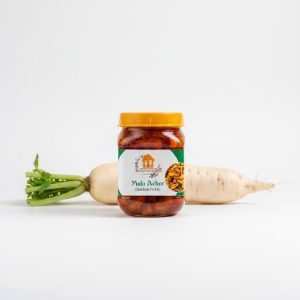 Authentic Nepali Mula ko Achar (Radish Pickle) jar with traditional spices.